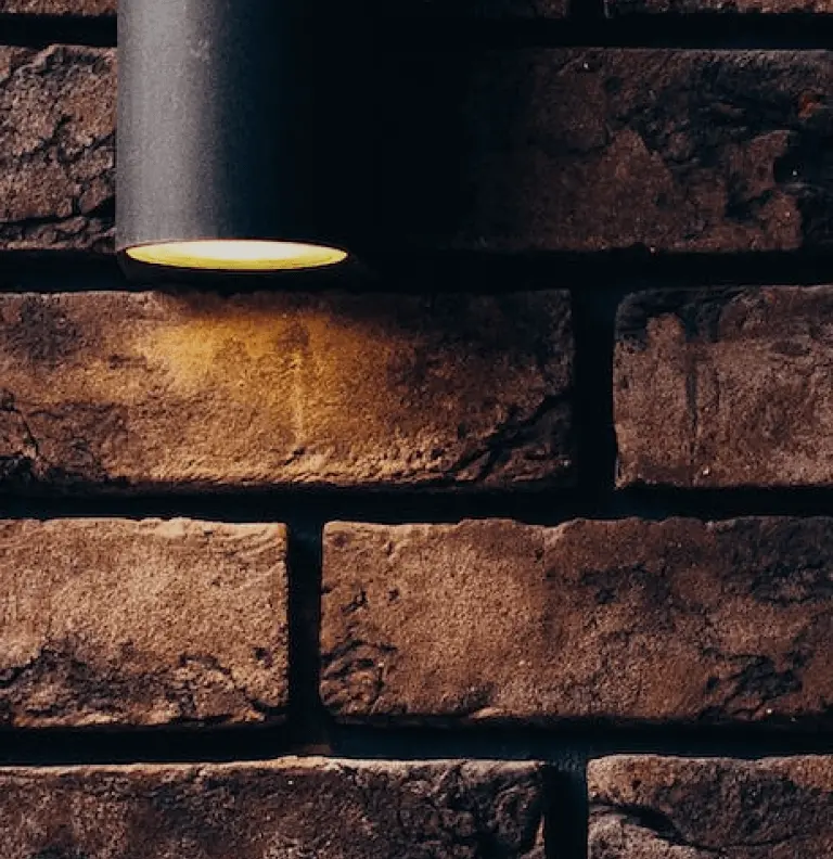 a brick wall with a light